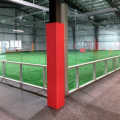 Red Safety Pilaster Wrap 64 to 104 Inch Inside Dimension on square post in gym