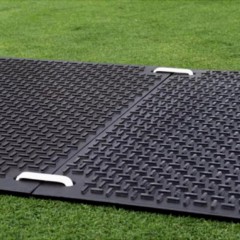 Mat-Pak Ground Protection VersaMats 4x8 ft Black showing installation.